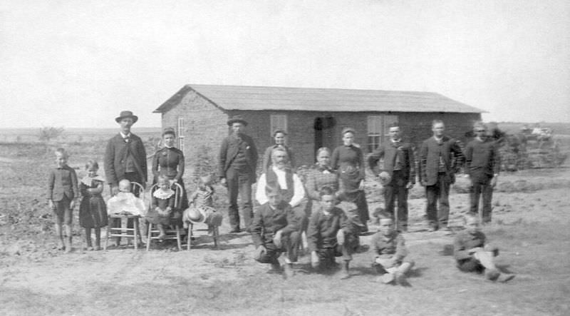 Burton family with sod house, Bartley, Nebraska