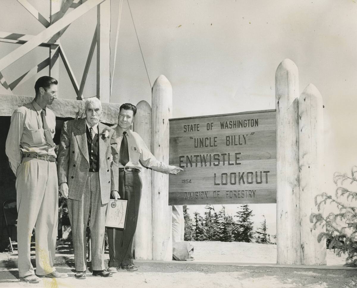 G.S. Williams, William Entwistle, and L.T. Webster at Entwistle Lookout, 1954