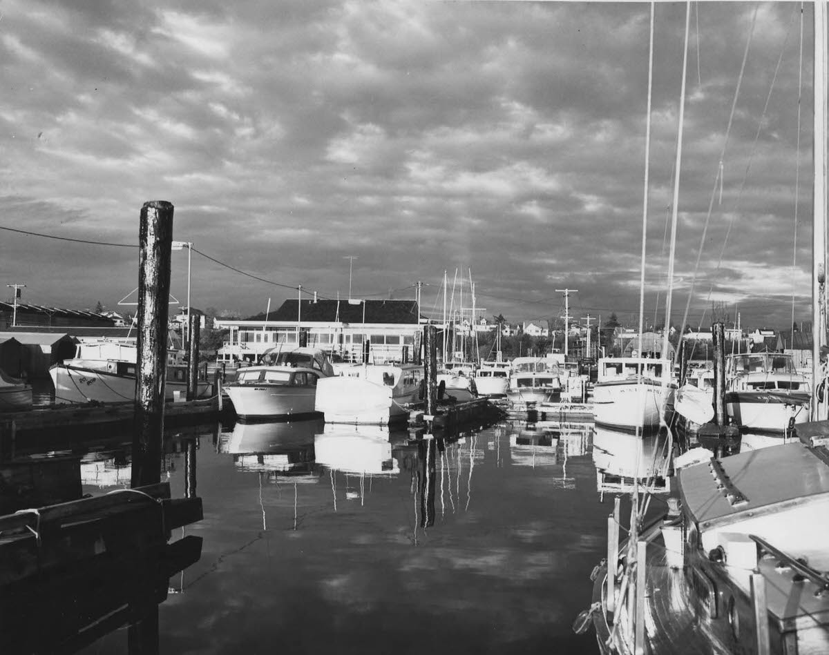 Boats in Squalicum Harbor, Bellingham Yacht Club building, 1900