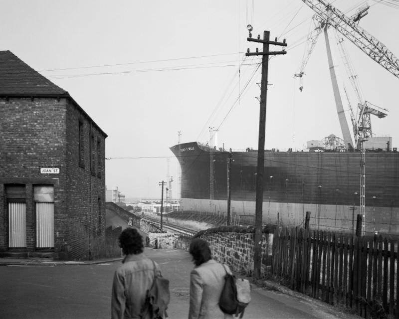 Shipyard workers looking at the Everett F Wells, Wallsend, 1977