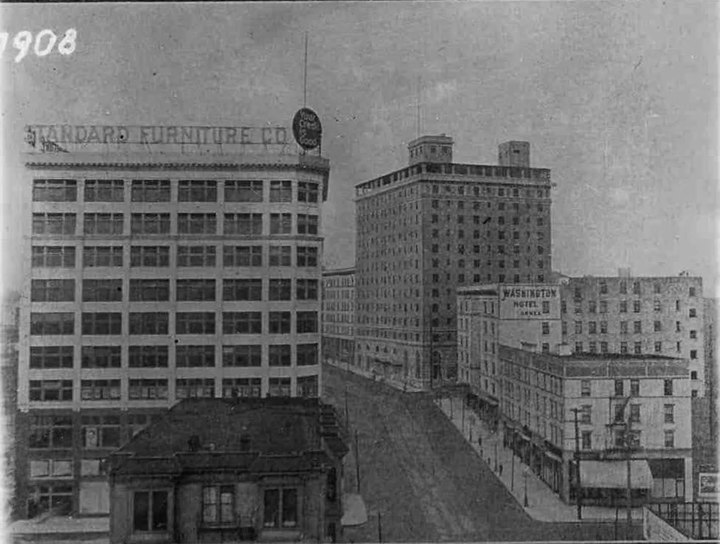 A postcard shows the Washington Hotel atop Denny Hill before Denny Regrade No. 1 and the New Washington Hotel