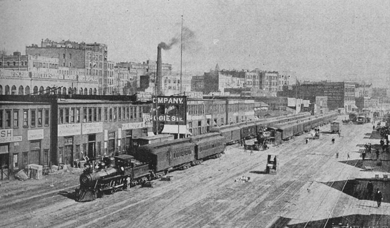 Railroad Avenue, today’s Alaskan Way, depicted here in 1900, was built on fill from the early regrades.