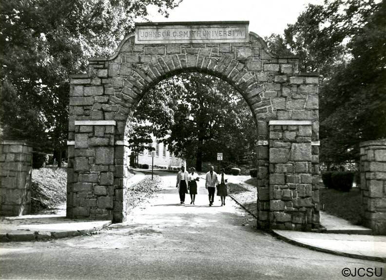 Entrance arch with students, 1970s