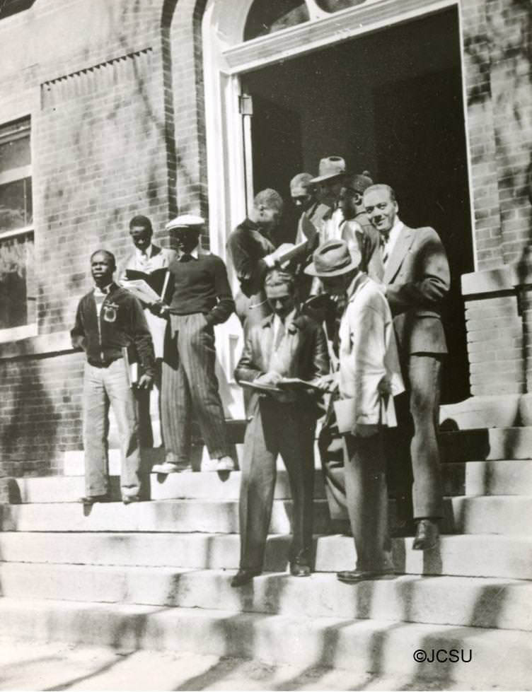 Group of students on the steps of Biddle Hall, 1960s