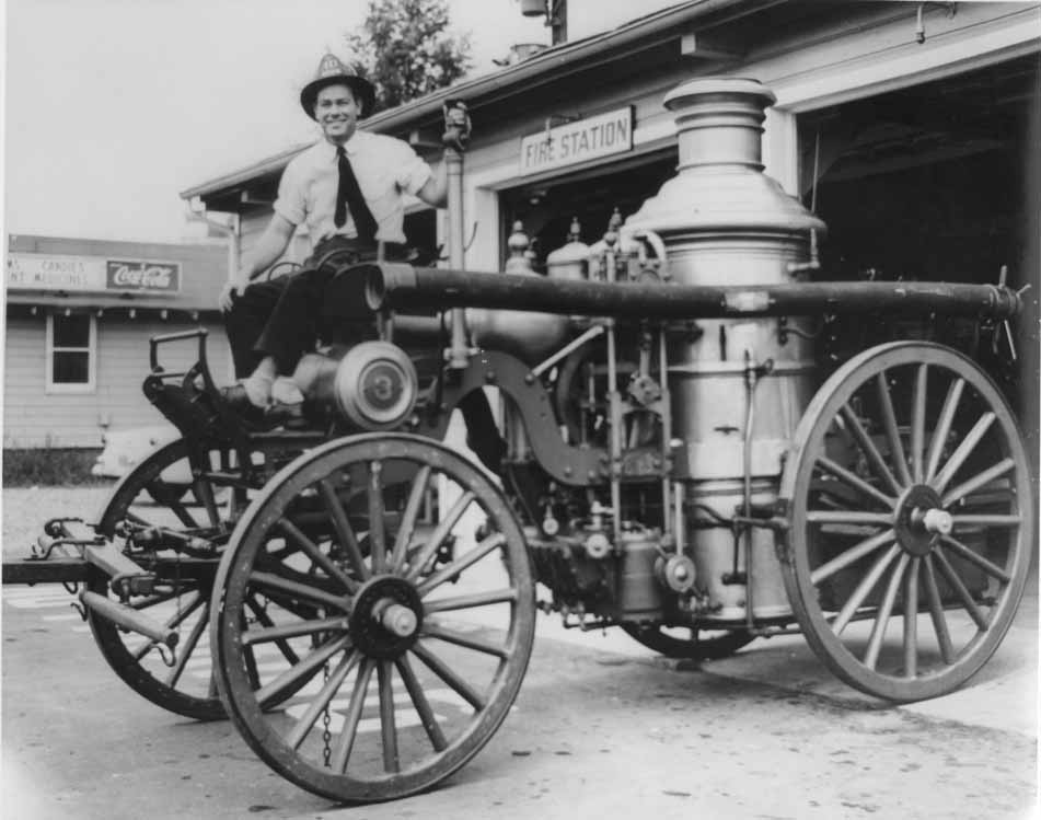 Steam fire engine at a Charlotte station, 1965