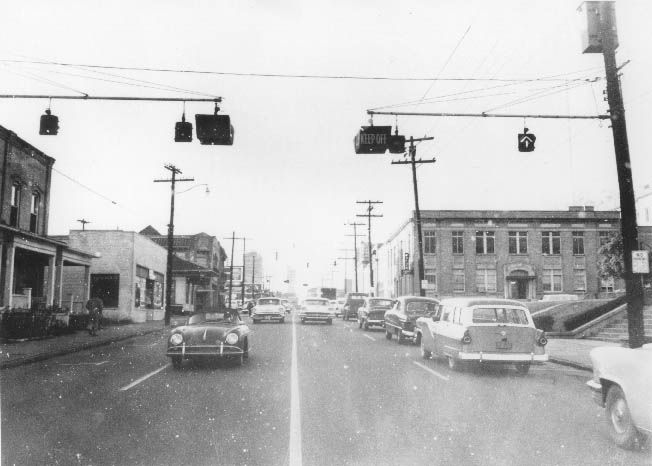 A view of East Fourth Street from the County Courthouse towards Alexander Street, 1958