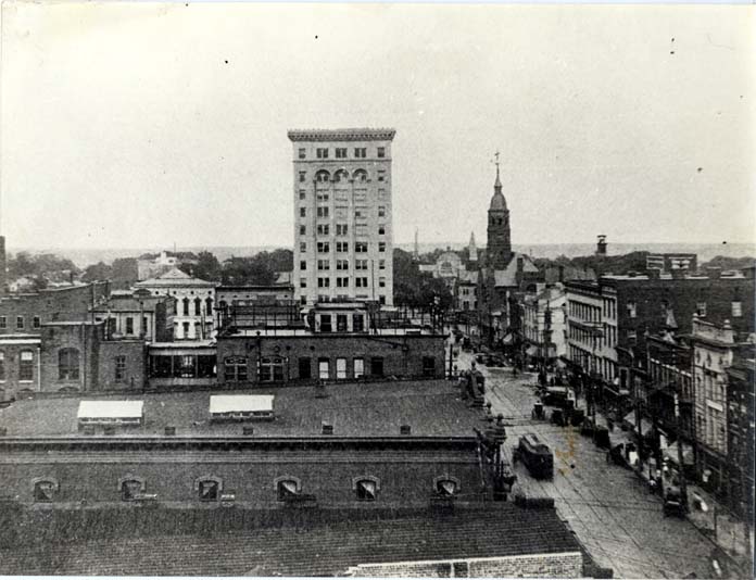 Aerial view of Charlotte features City Hall, the Realty Building, and trolleys, 1900