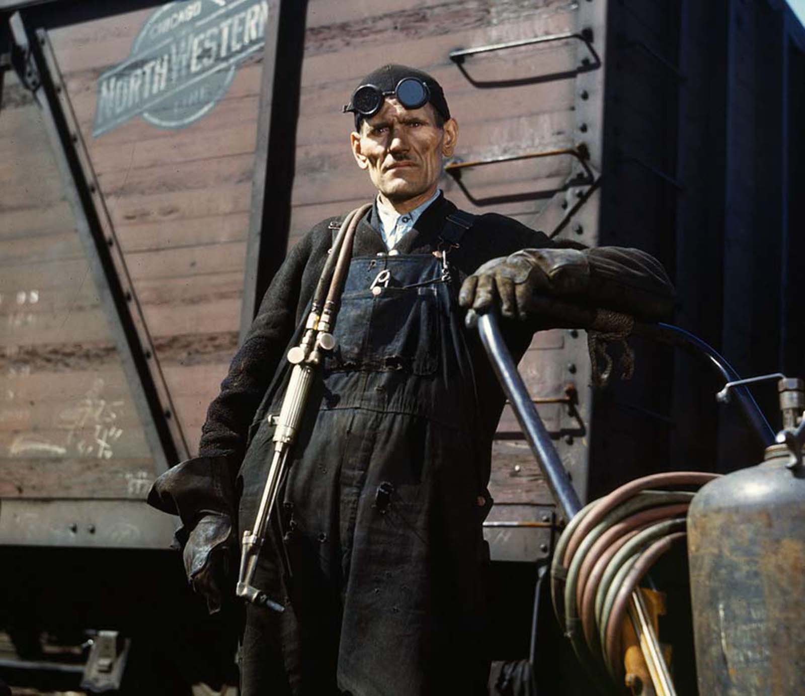 Mike Evans, a welder, at the rip tracks at the Proviso yard, photographed in April 1943.