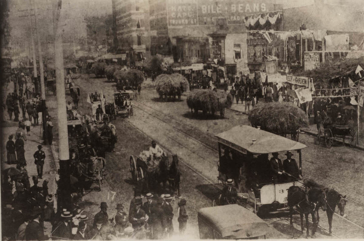 Parade of Straw for G.A.R. camps traveling down High Street, September 6, 1888