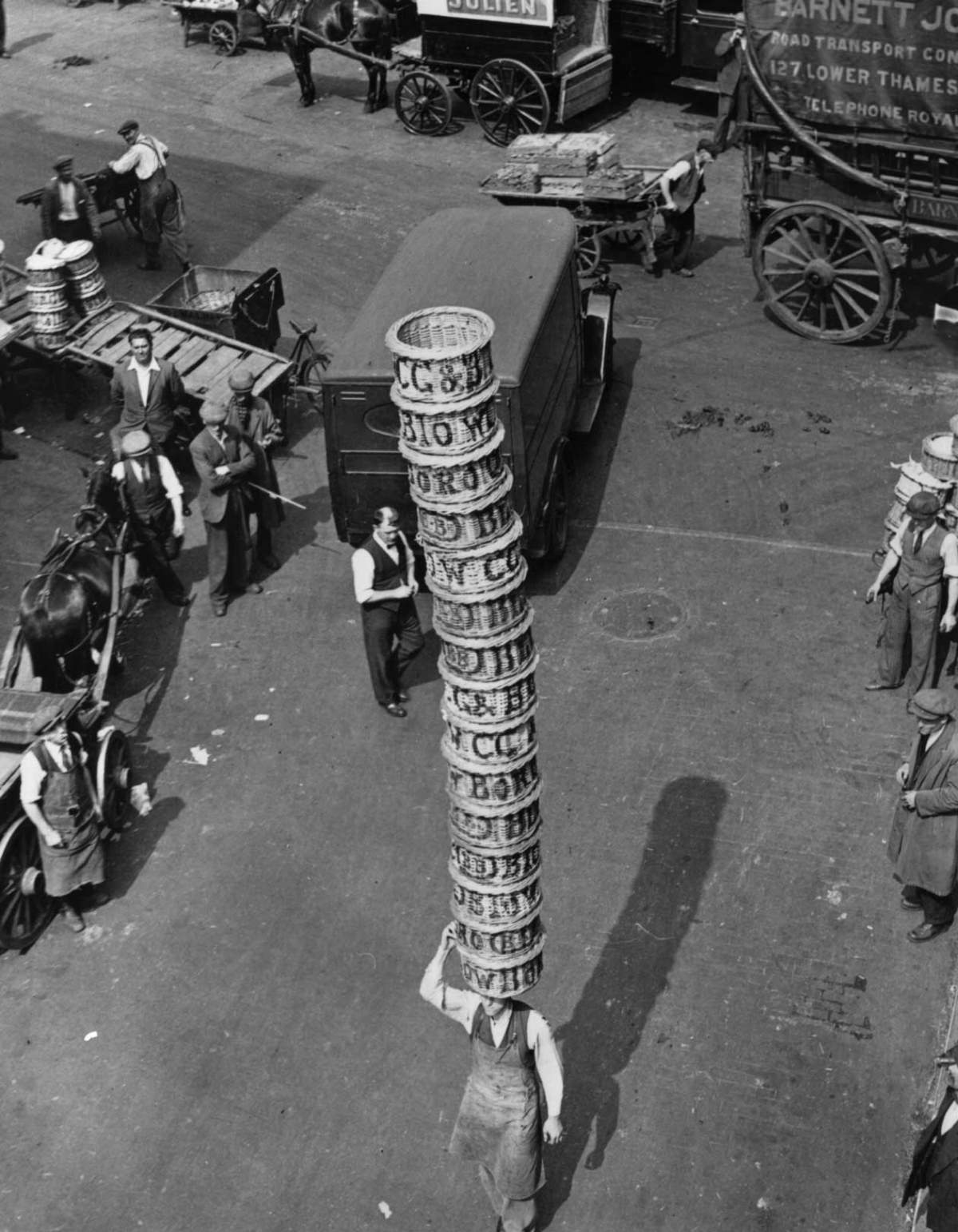 A competitor in the Basket Carrying Championships at Covent Garden, London, 1933.