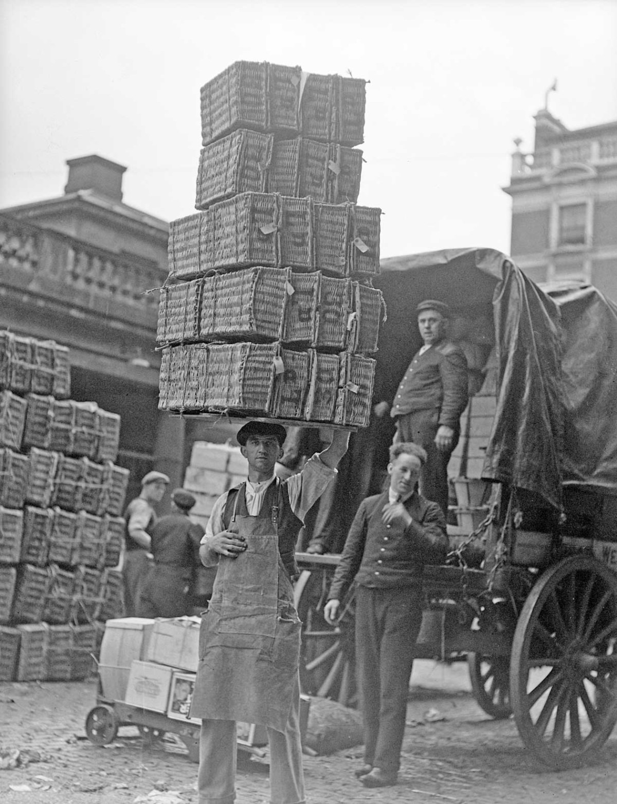 Transporting market baskets, 1930.