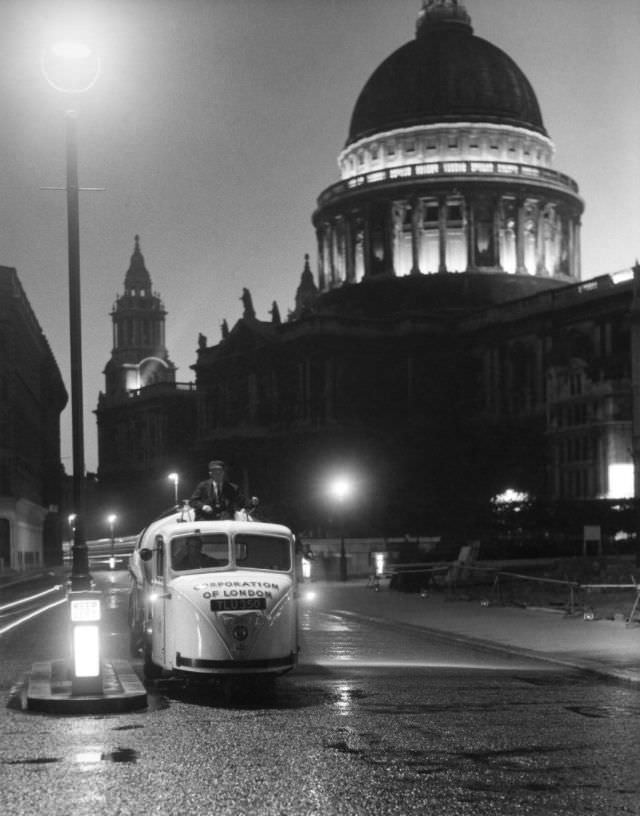 Night street cleaning near St Paul’s Cathedral, London