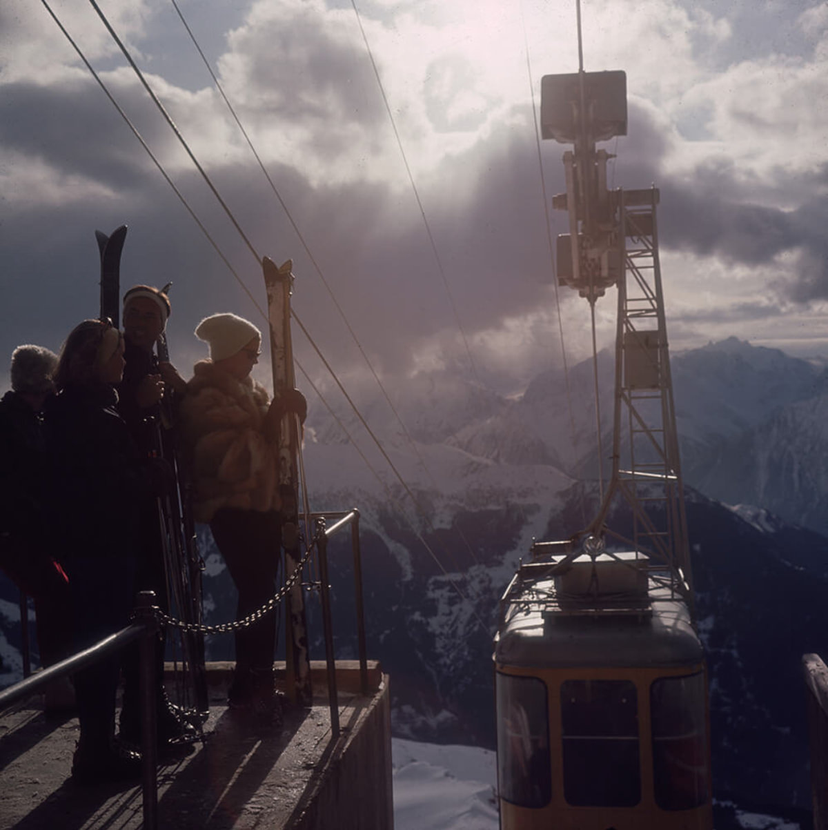 Skiers waiting for the cable car at Verbier in Switzerland, 1964.