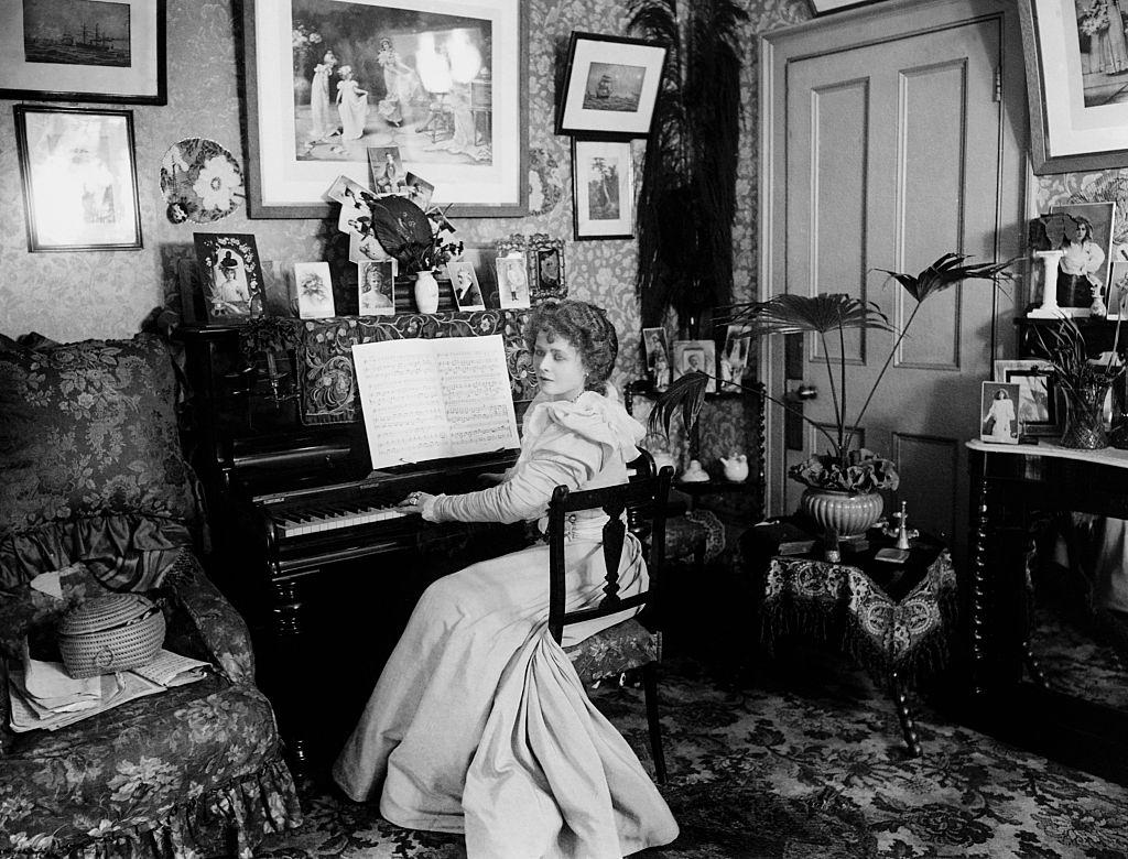 Mabel Love Playing the Piano, 1918.
