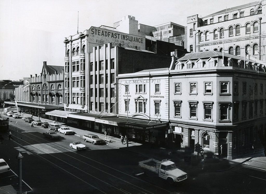 Elizabeth Street in Melbourne between Lonsdale and Little Bourke Streets with Myer emporium in the background and the Post Office Hotel in the foreground, 1970