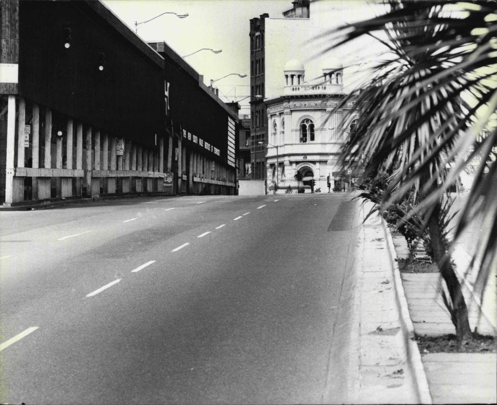 The Partially deserted scene on Broadway (Looking north) as the Melbourne Cup was running, 1976