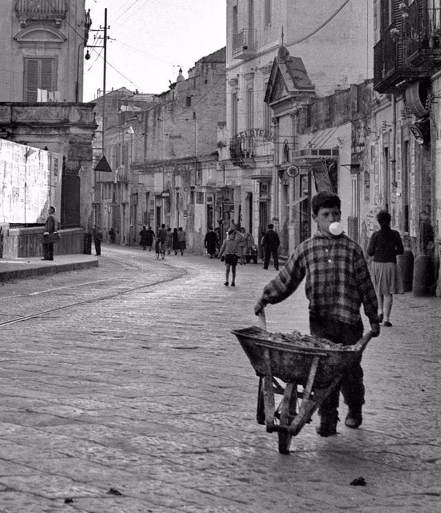 A boy with trolley.