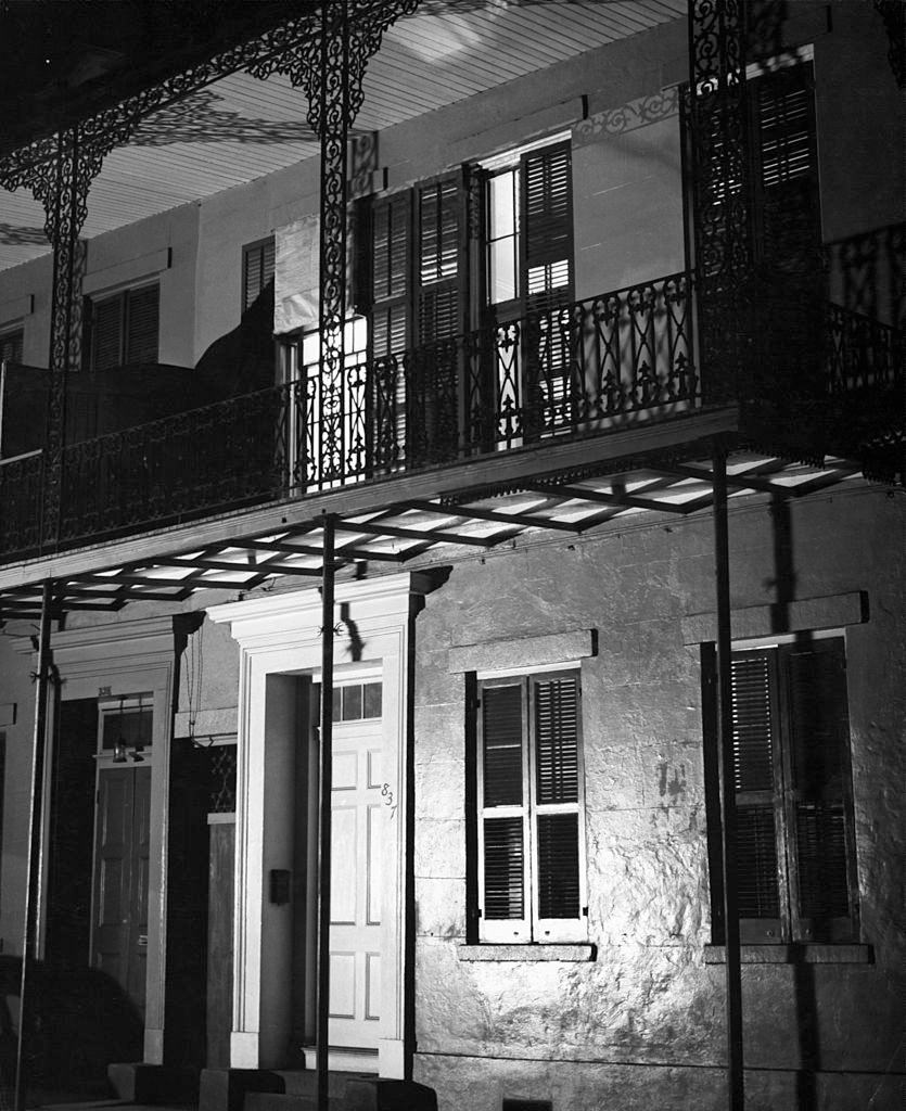 A view of a facade at night in New Orleans, 1950.