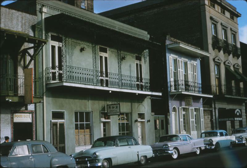 Wrought iron balconies and cars, New Orleans, 1956.