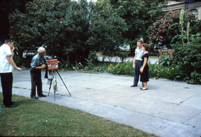 Young couple being photographed in Jackson Square, New Orleans, 1956.