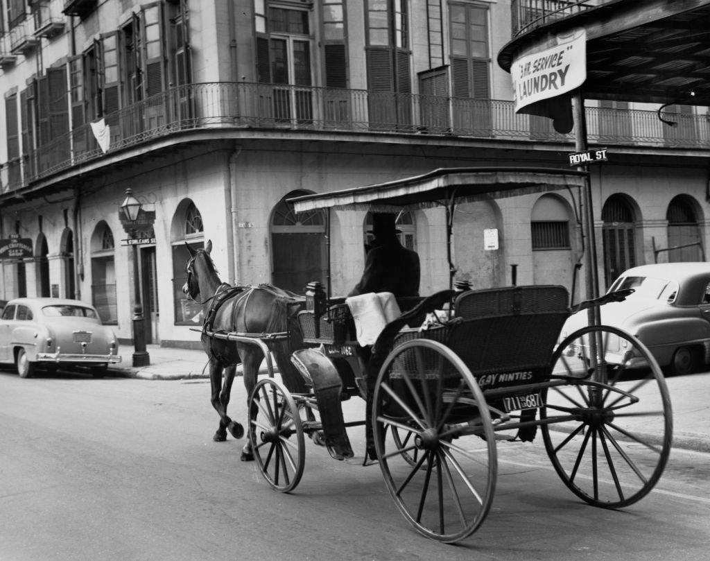 Old horse-drawn carriage on Royal Street, New Orleans, 1955.