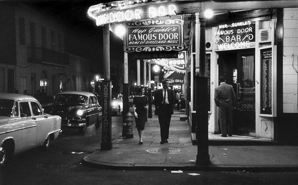 The entrance to the 'Famous Door Bar' Dixieland jazz club in the French quarter (Vieux Carre) of New Orleans, 1955.