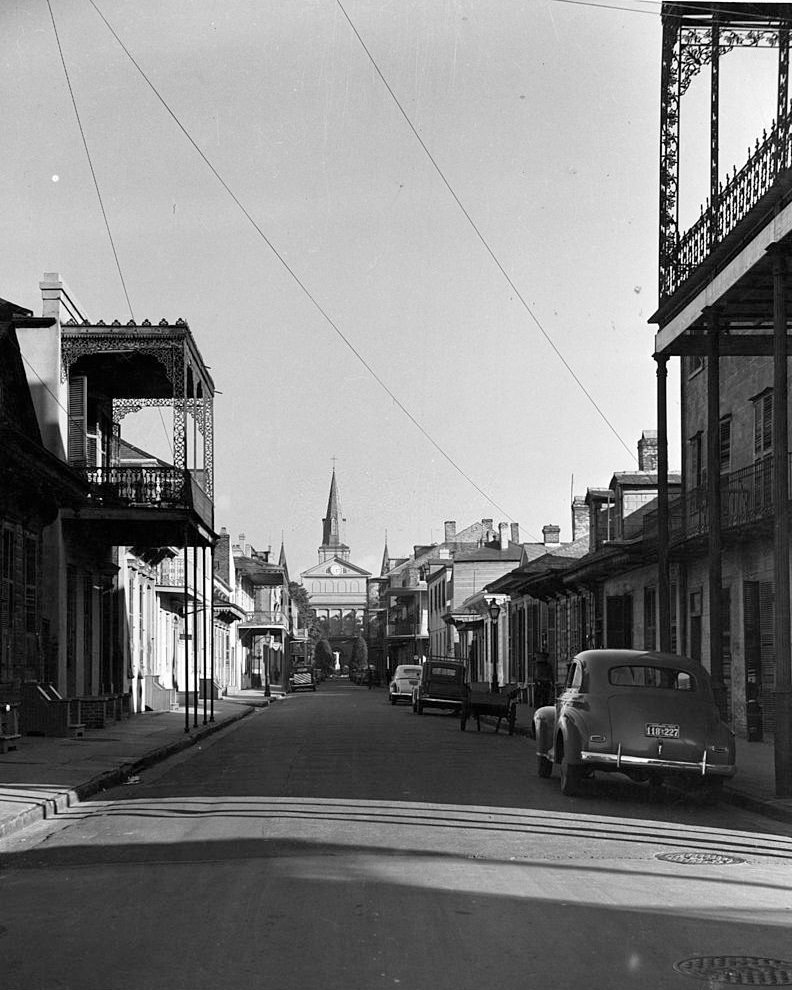 Corner of Dauphine and Orleans looking down Orleans at the back of the St. Louis Cathedral, 1950