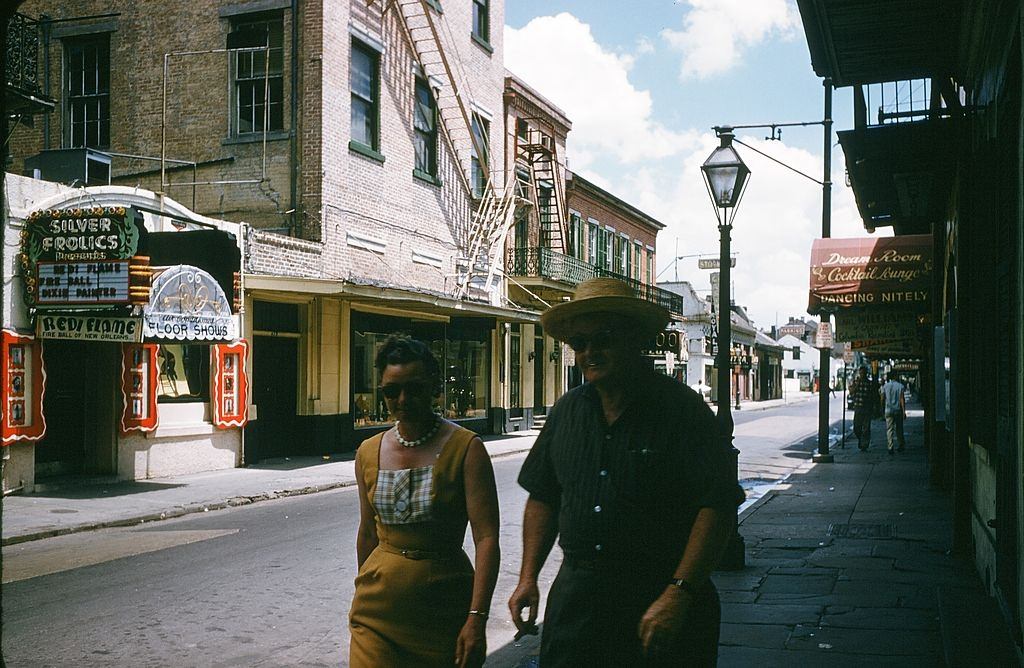A view down Bourbon street outside Silver Frolics in New Orleans, 1957