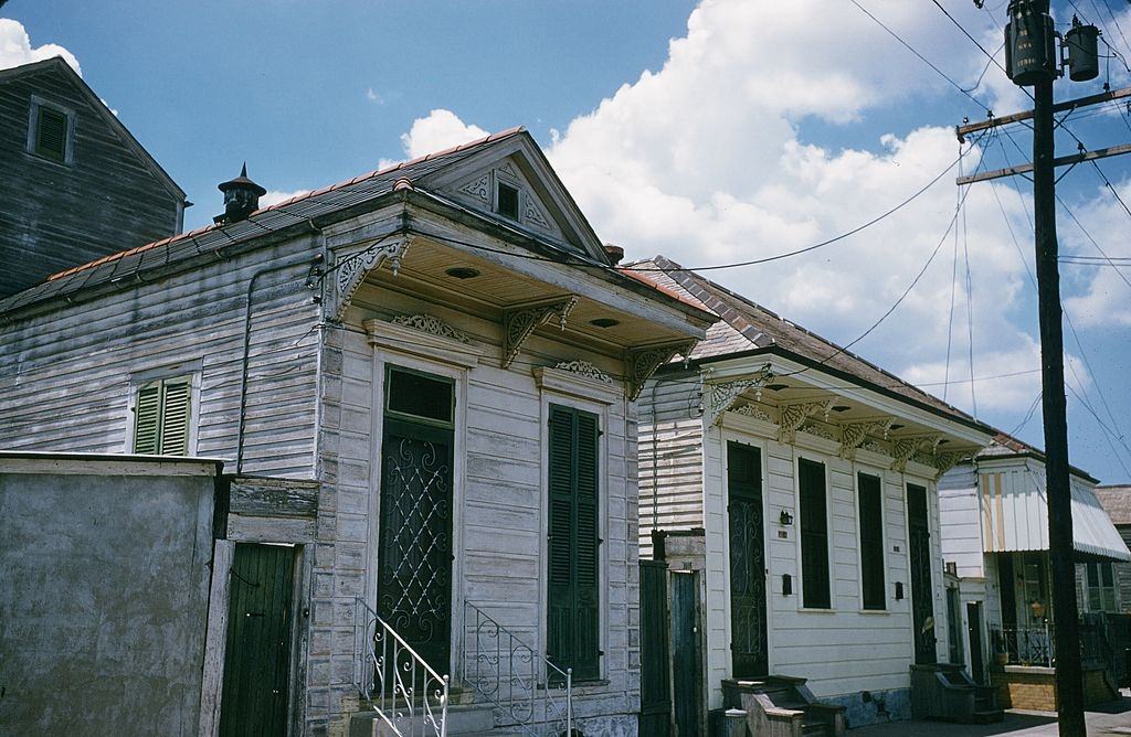 A street view of boarded up homes in New Orleans, 1957.