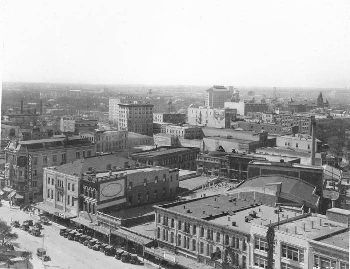 West side of Alamo Plaza as seen from top of Medical Arts Building, San Antonio, 1927