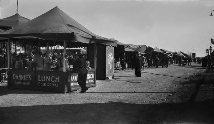 Food booth on the midway at Rice-Dorman Carnival, International Exposition and Live Stock Show, San Antonio, 1925