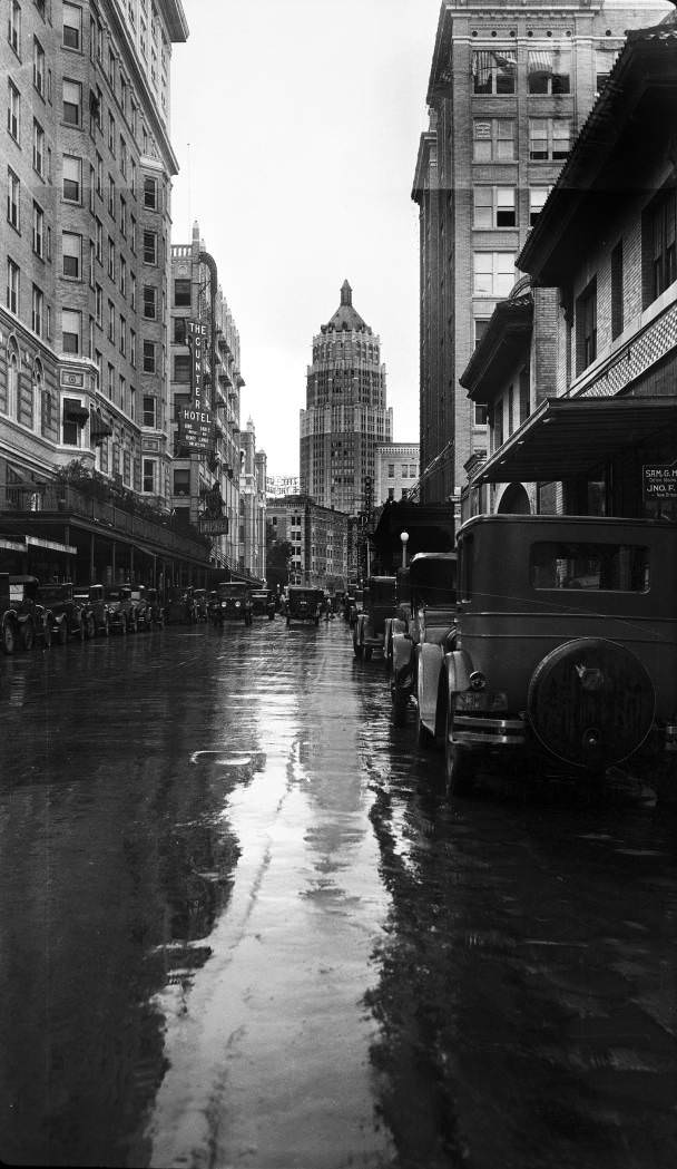 St. Mary's Street looking south from Travis Street following a rain shower, San Antonio, 1929