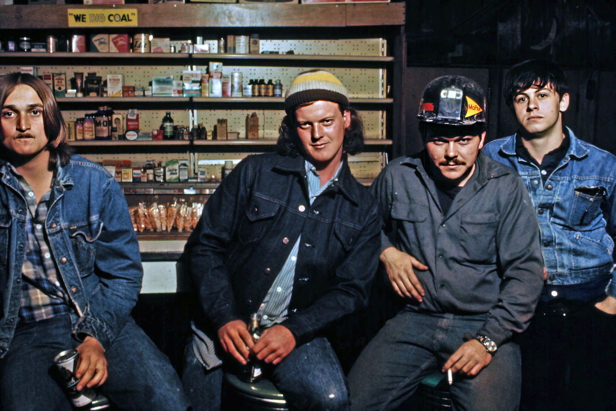 Four young men gather in a beer joint in Clothier, West Virginia, near Madison.