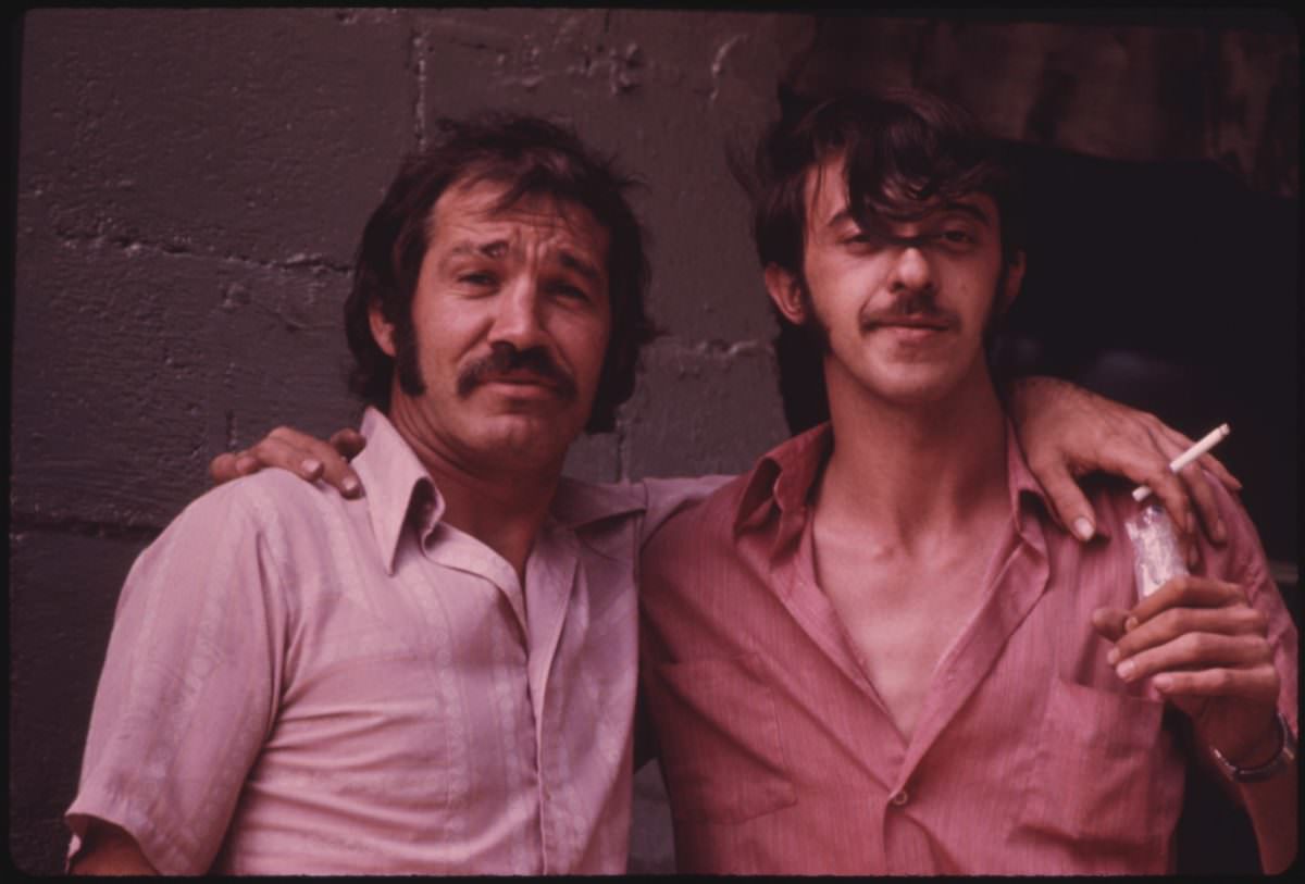 Two Miners Relaxing in a Beer Joint after Finishing Their Shift There Is Little to Do in Many of the Small Mining Towns for the Young Men Other Than Drink Beer and Talk.