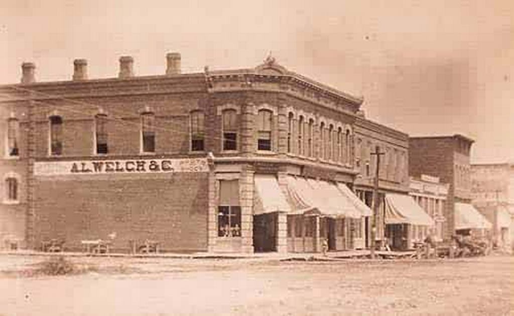 A.L Welch & Co., Boots and Shoes, SW corner Pearl 1879