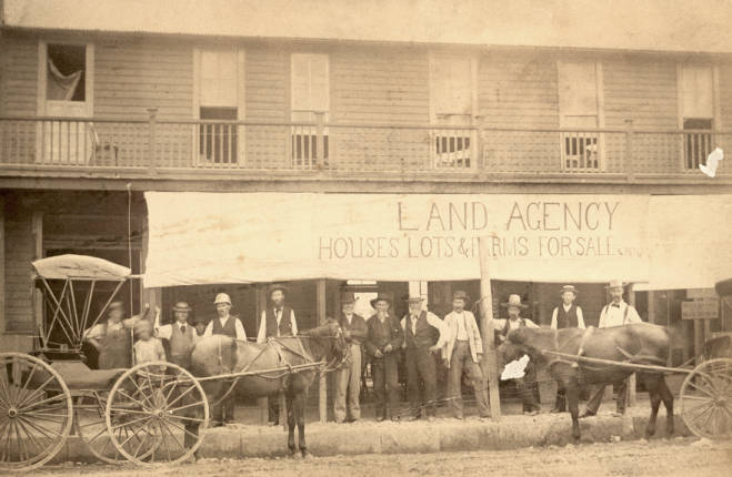Land agency on the corner of Lancaster and Main Street, 1880