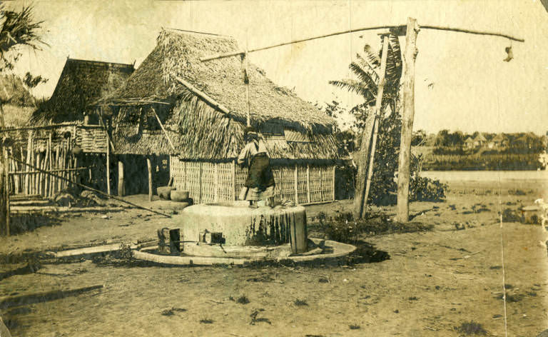 Villager at Community Well, 1899