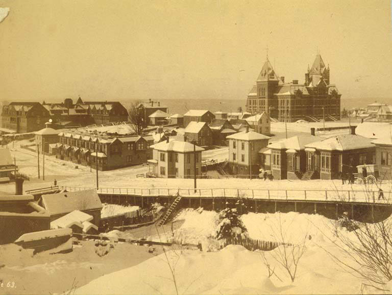 Looking west from 7th Ave. and Columbia St. after a snowfall, Seattle, 1890