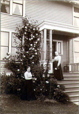 Mary Soule and her sister Mrs. McAlpin in front of Soule residence, 1353 32nd Ave. S., Seattle, 1899
