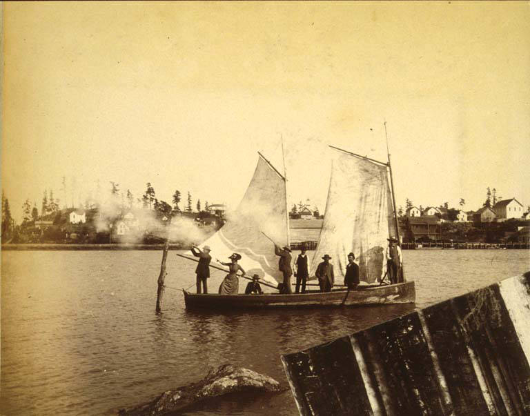 Men and women in a sailboat shooting guns, 1889