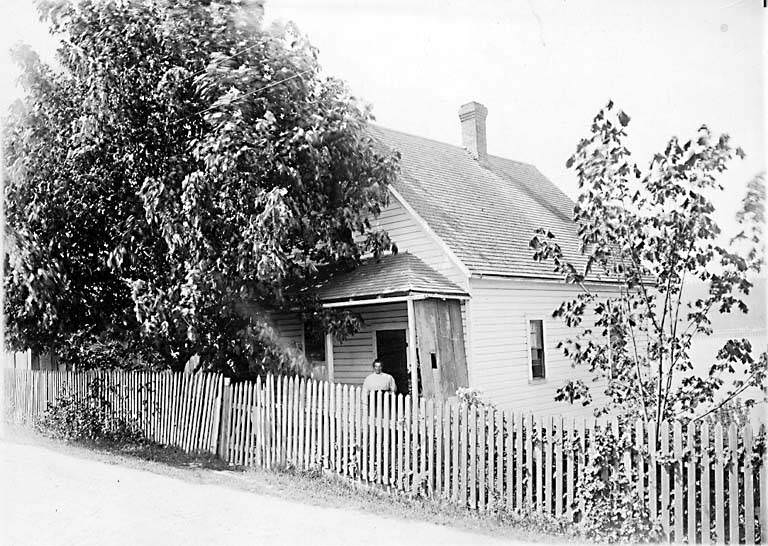 1st Ave. showing residence, 1870