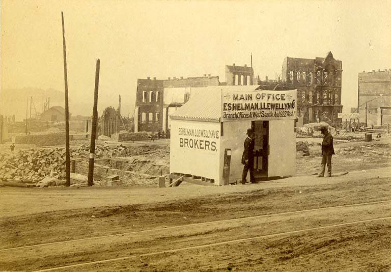 Office tent of Eschelmen, Llewellyn & Co. in the ruins of the Seattle fire of June 1889