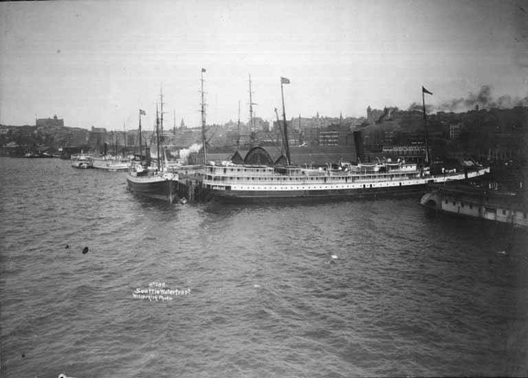 Ships at dock on the waterfront near Pier A at the foot of Washington Street, Seattle, 1897.