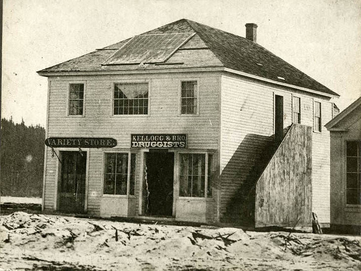 Kellogg's Drugstore and Pinkham's Variety Store at 1st Avenue and Yesler Way, 1885