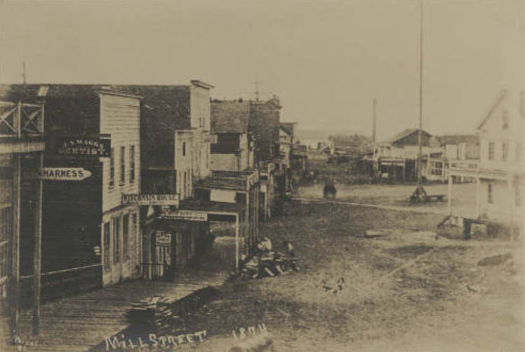 Yesler Way west from 2nd Avenue, 1874