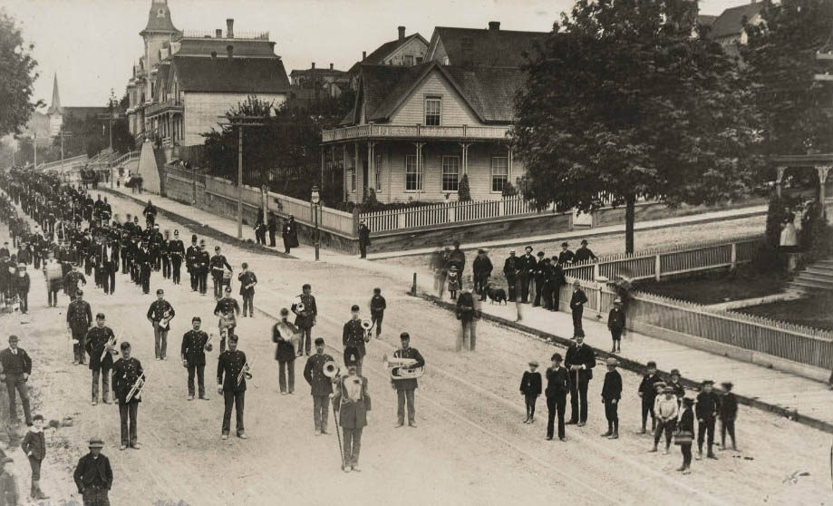 Military parade at Second Ave and Columbia Street, 1886