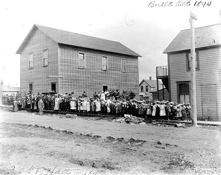 Children standing outside I.O.G.T. Hall (International Organization of Good Templars), 1897