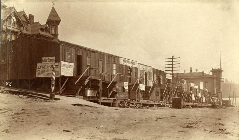 Temporary buildings at 3rd Ave. and James St. following fire, June 1889
