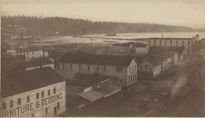 Buildings and railroad trestle at South Lake Union, 1880