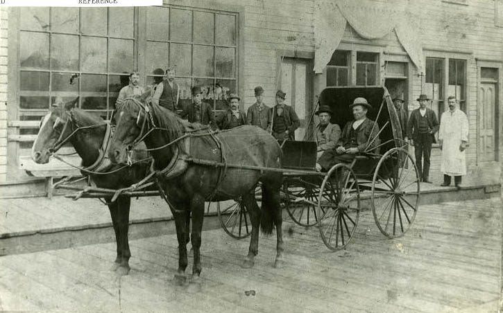 Hans and Nels Nelson at corner of Dock Pl. and Ballard Avenue, 1892